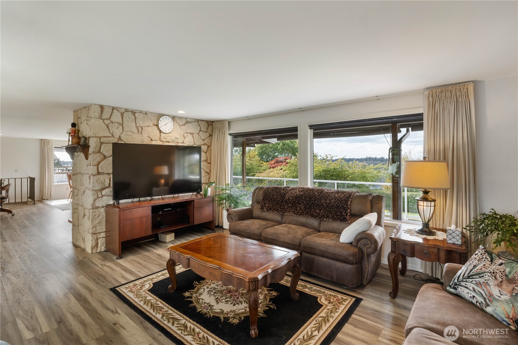 4911 Mildred Street Tacoma, WA 98407 - Photo 17 of 40 a living room with furniture and a flat screen tv