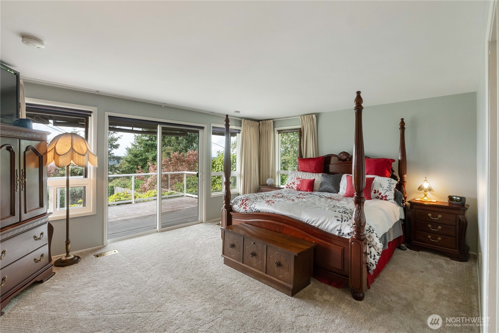 4911 Mildred Street Tacoma, WA 98407 - Photo 18 of 40 a bed room with a bed and a television