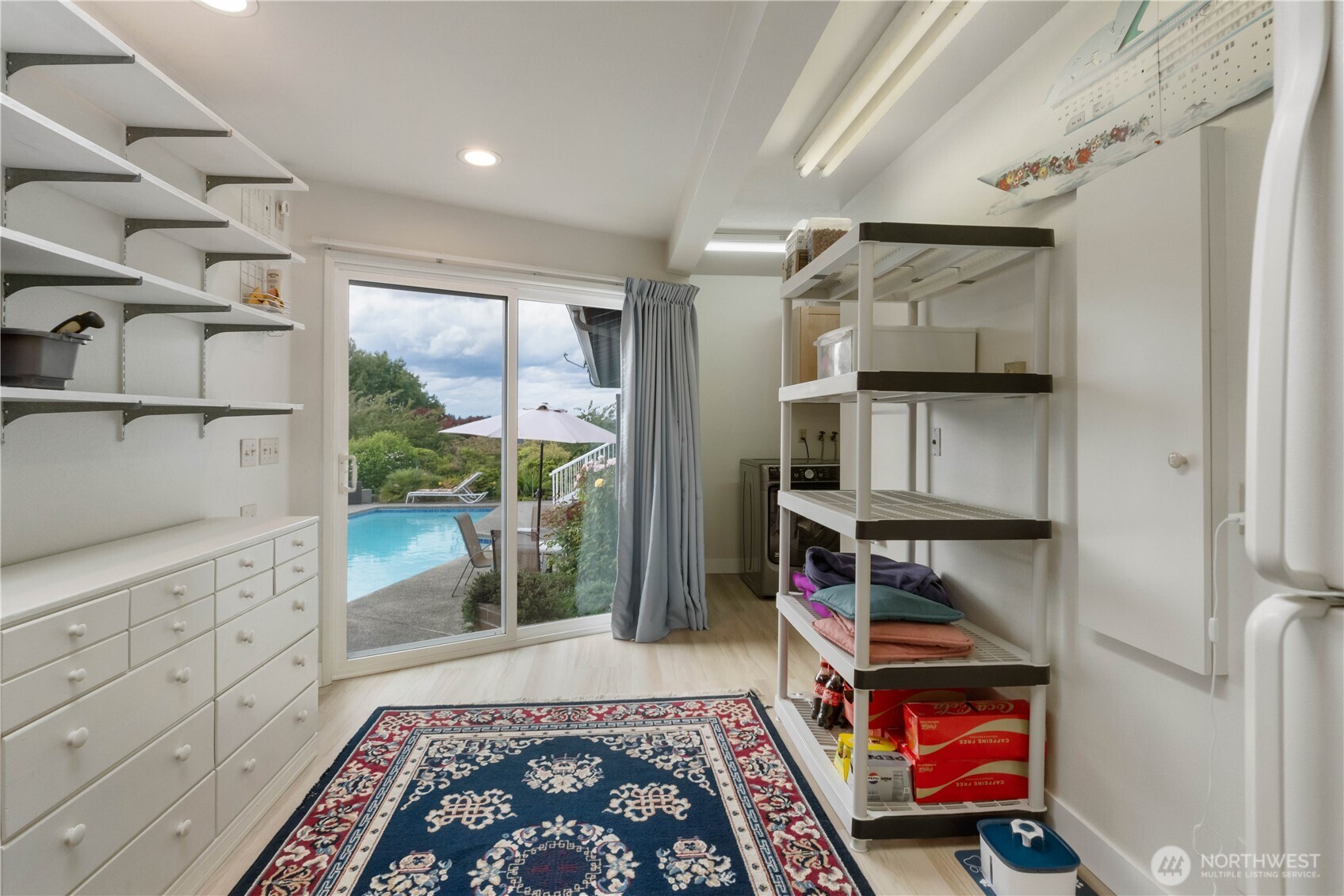 4911 Mildred Street Tacoma, WA 98407 - Photo 24 of 40 a room with furniture a rug and a window