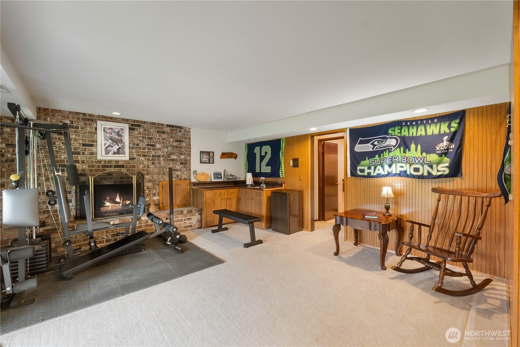 4911 Mildred Street Tacoma, WA 98407 - Photo 25 of 40 a view of a livingroom with furniture and a fireplace