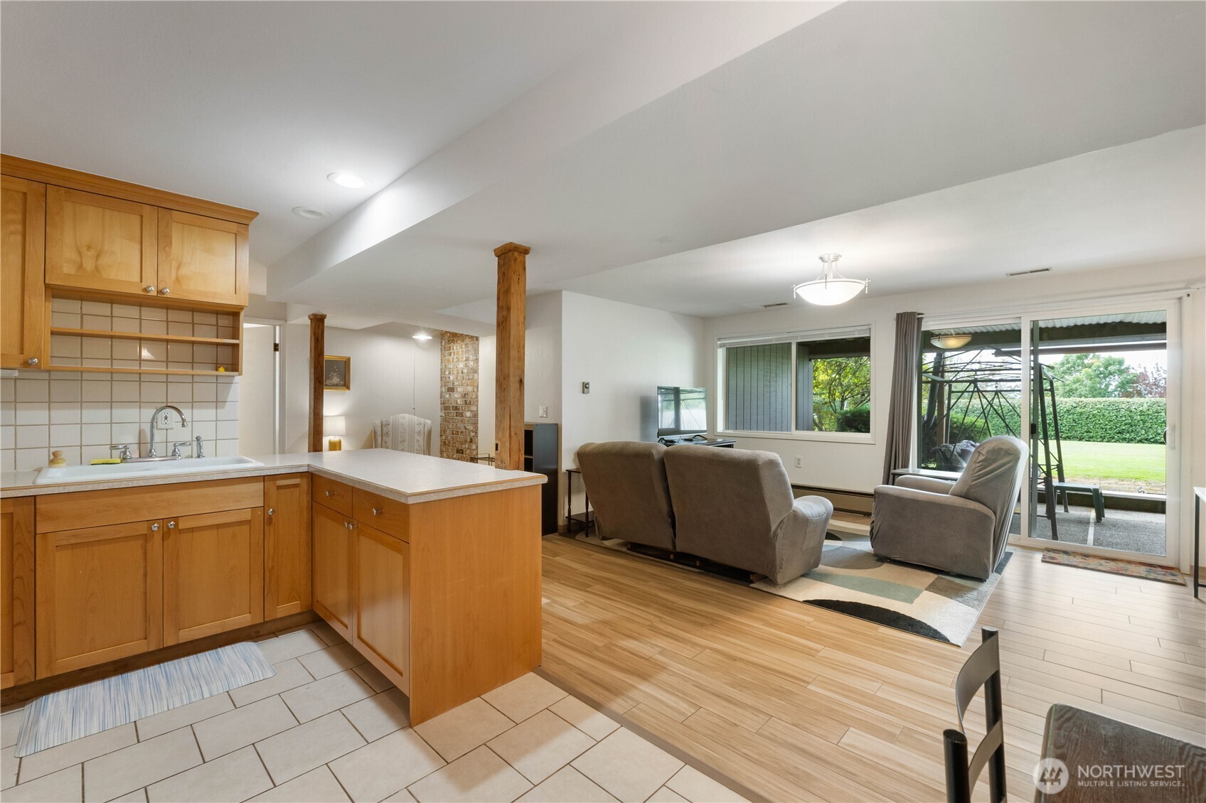 4911 Mildred Street Tacoma, WA 98407 - Photo 29 of 40 a living room with furniture and large windows