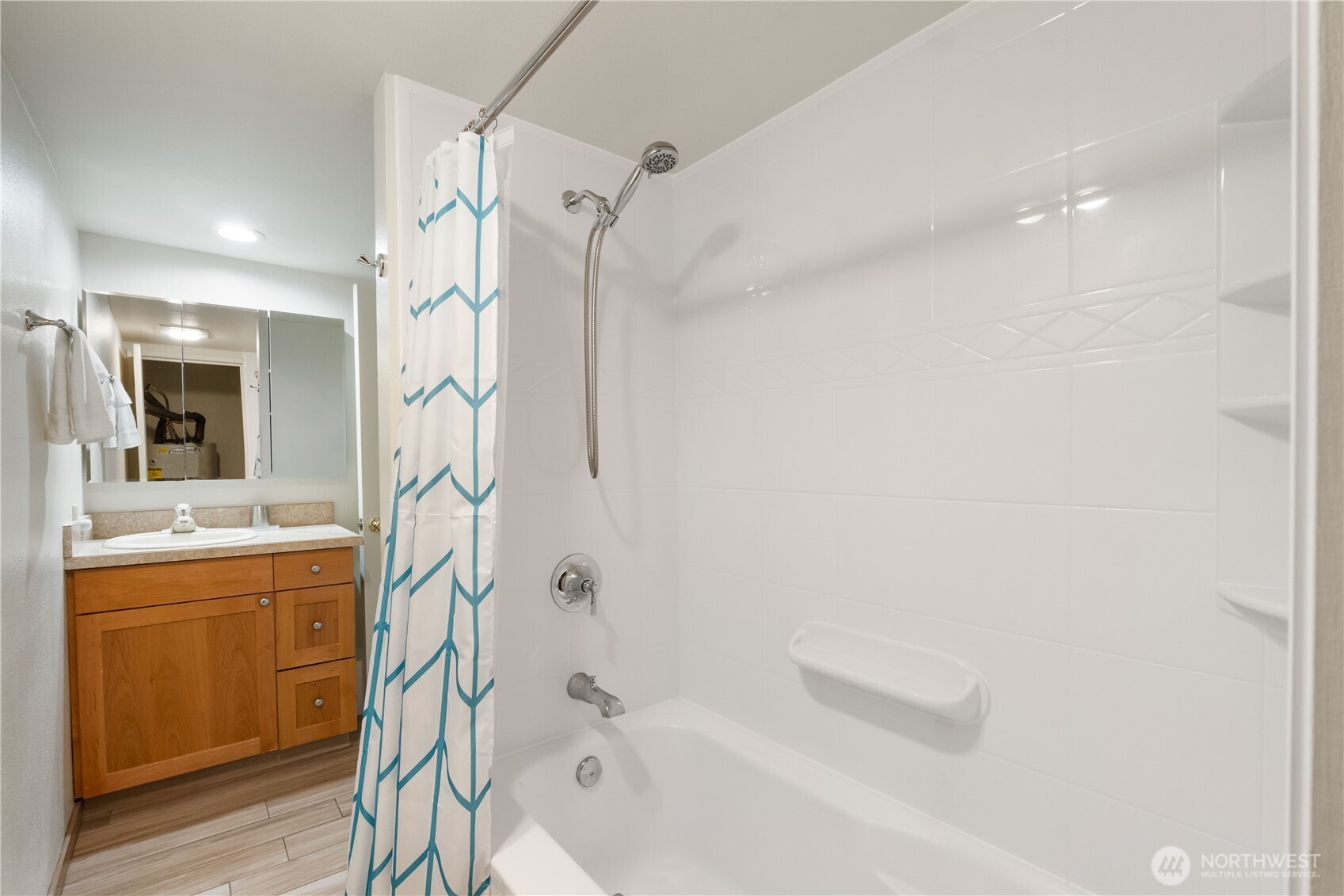 4911 Mildred Street Tacoma, WA 98407 - Photo 32 of 40 a bathroom with a bathtub and shower