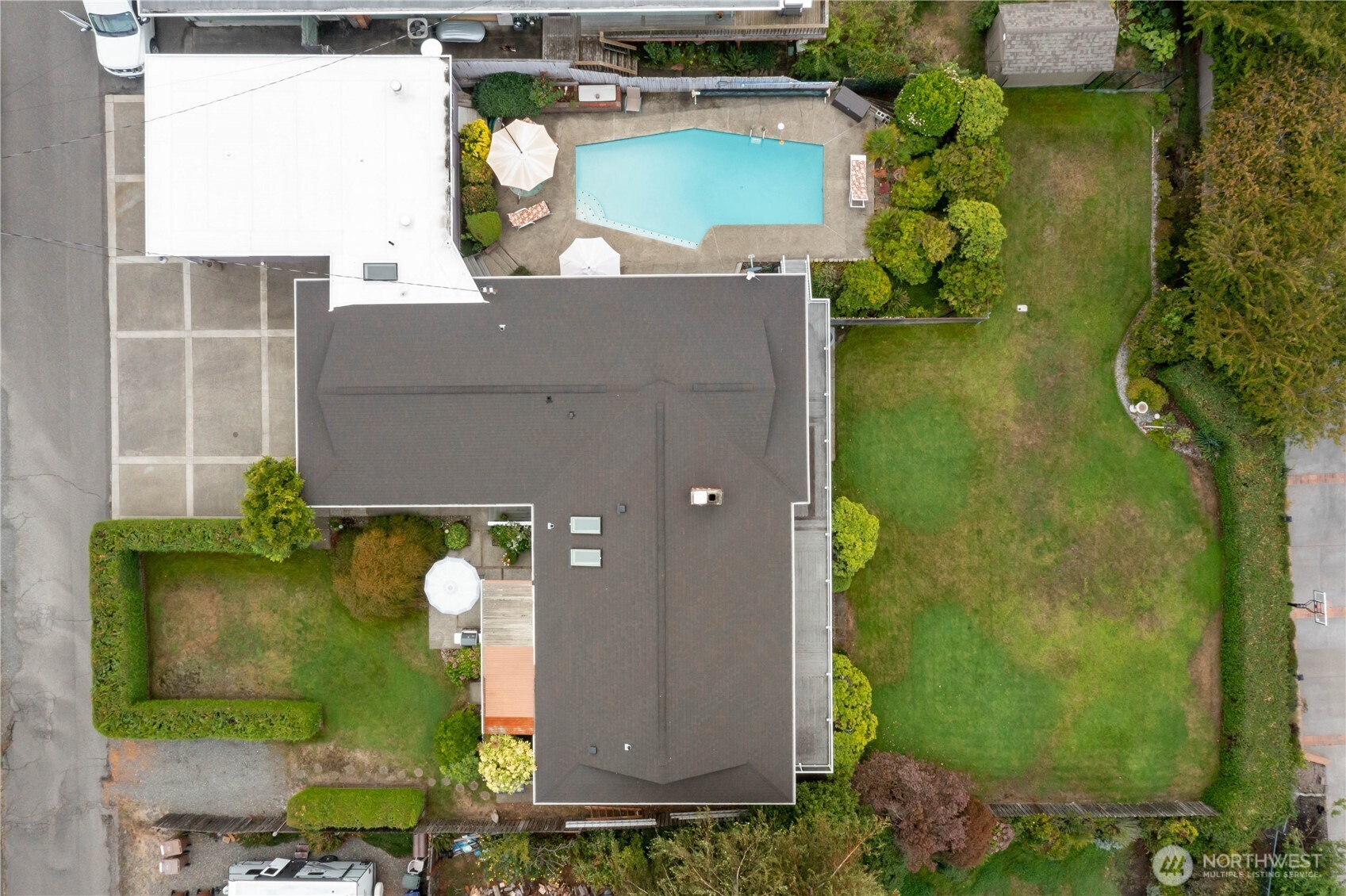 4911 Mildred Street Tacoma, WA 98407 - Photo 37 of 40 an aerial view of a house with yard swimming pool and outdoor seating