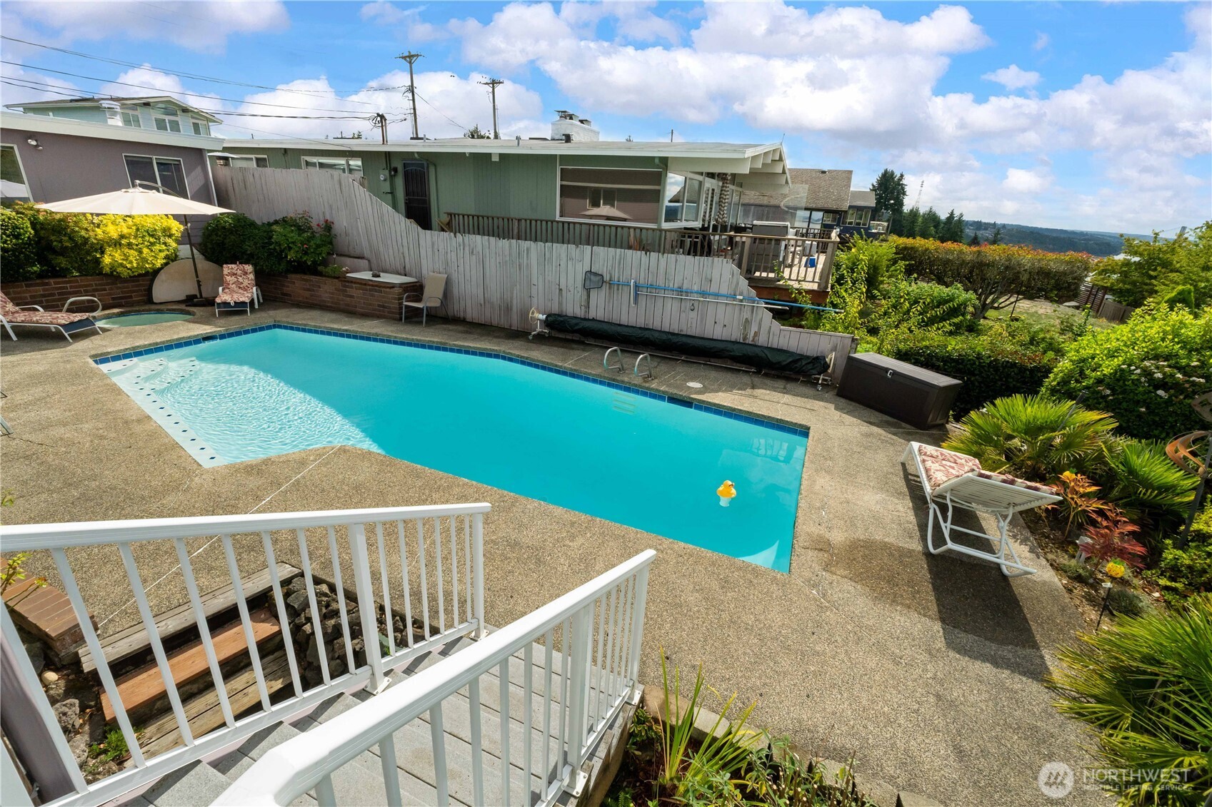 4911 Mildred Street Tacoma, WA 98407 - Photo 5 of 40 a view of a house with backyard and sitting area