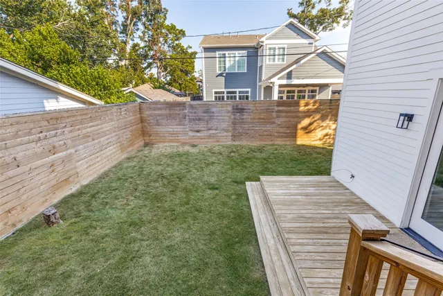 a view of front of house with a yard