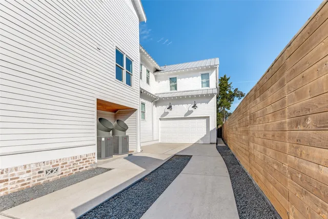 a view of a brick building with many windows