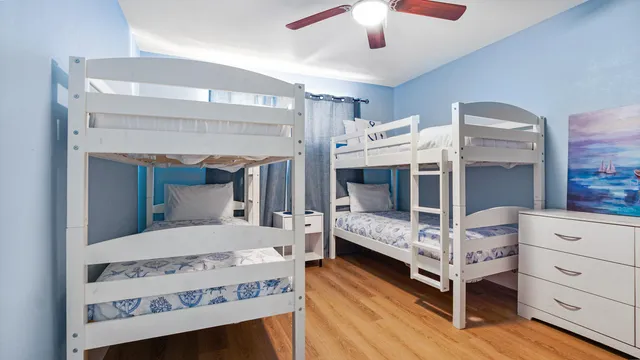 a bedroom with a bed and a view of bedroom