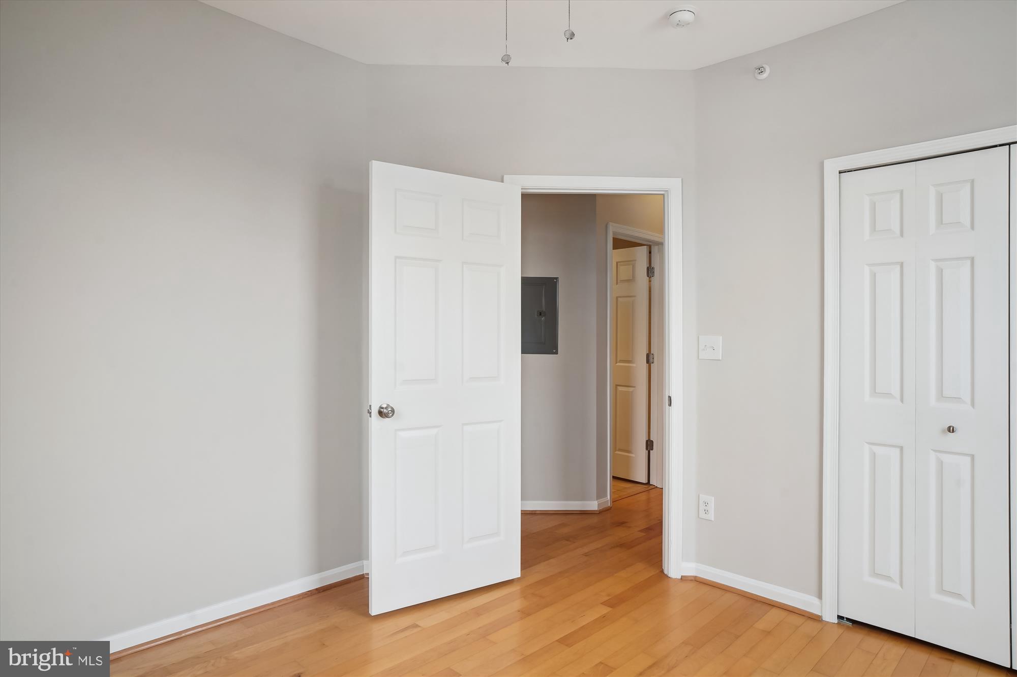 12712 Found Stone Road, Unit 4206 Germantown, MD 20876 - Photo 20 of 58 an empty room with wooden floor & closet area