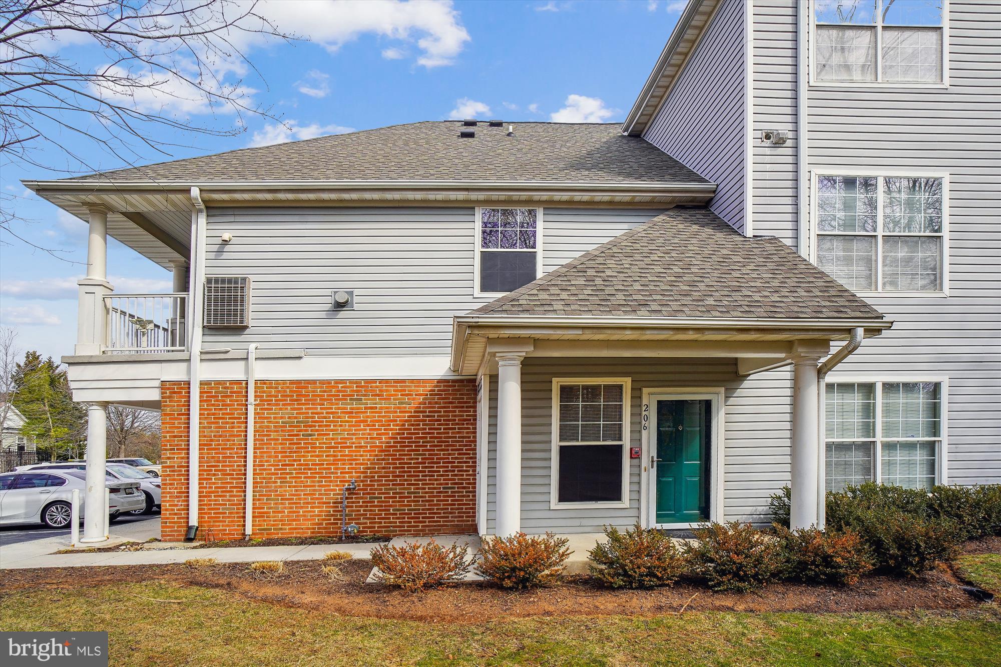 12712 Found Stone Road, Unit 4206 Germantown, MD 20876 - Photo 2 of 58 a front view of a house with garden