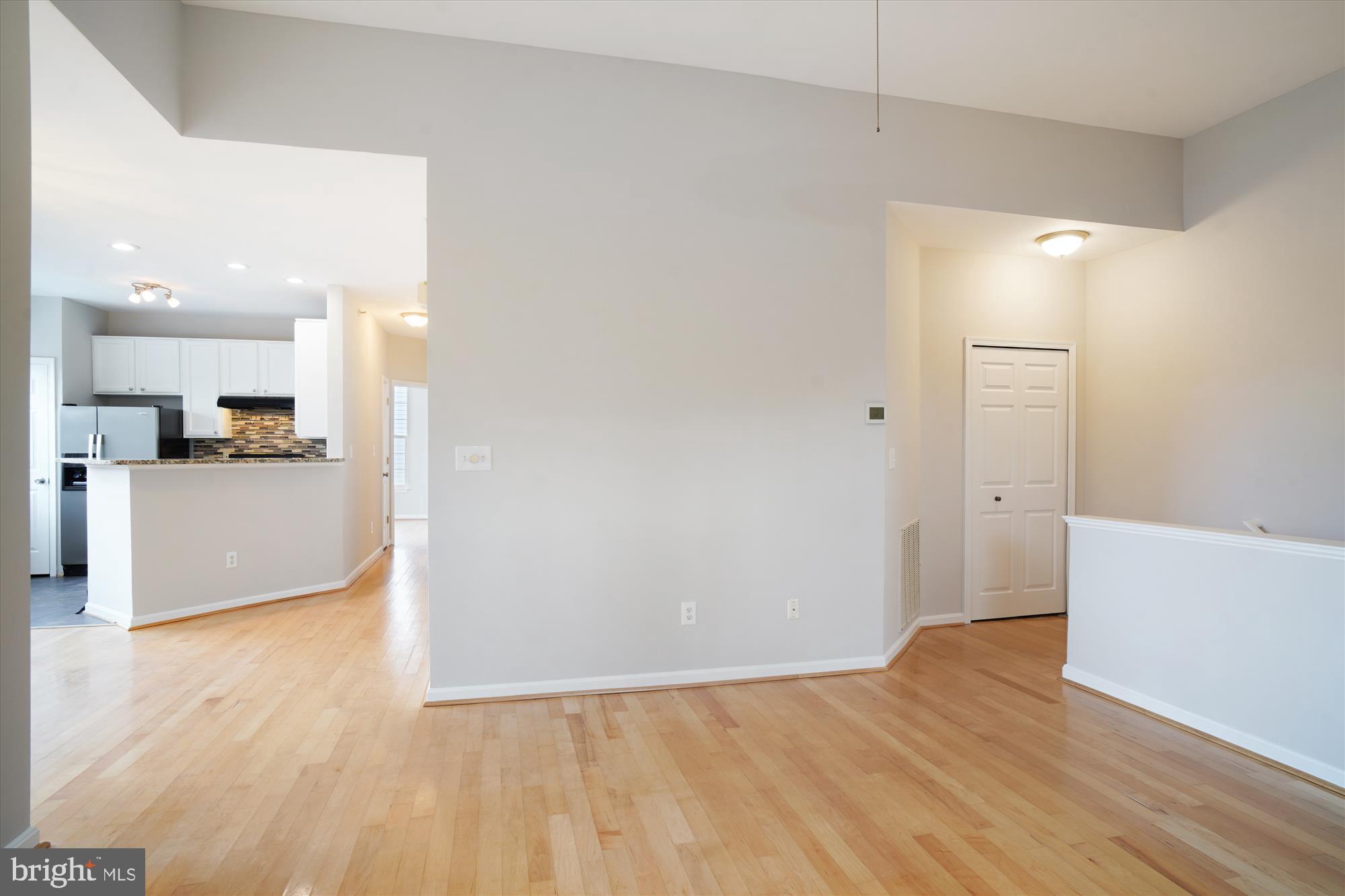 12712 Found Stone Road, Unit 4206 Germantown, MD 20876 - Photo 21 of 58 a view of kitchen with wooden floor