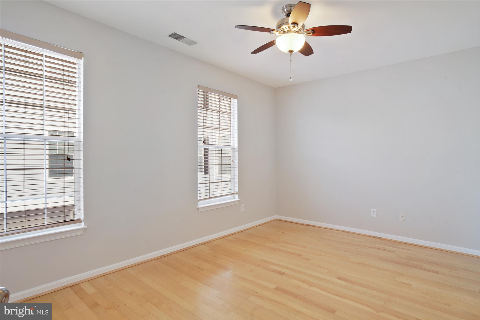 12712 Found Stone Road, Unit 4206 Germantown, MD 20876 - Photo 28 of 58 a view of an empty room with a window
