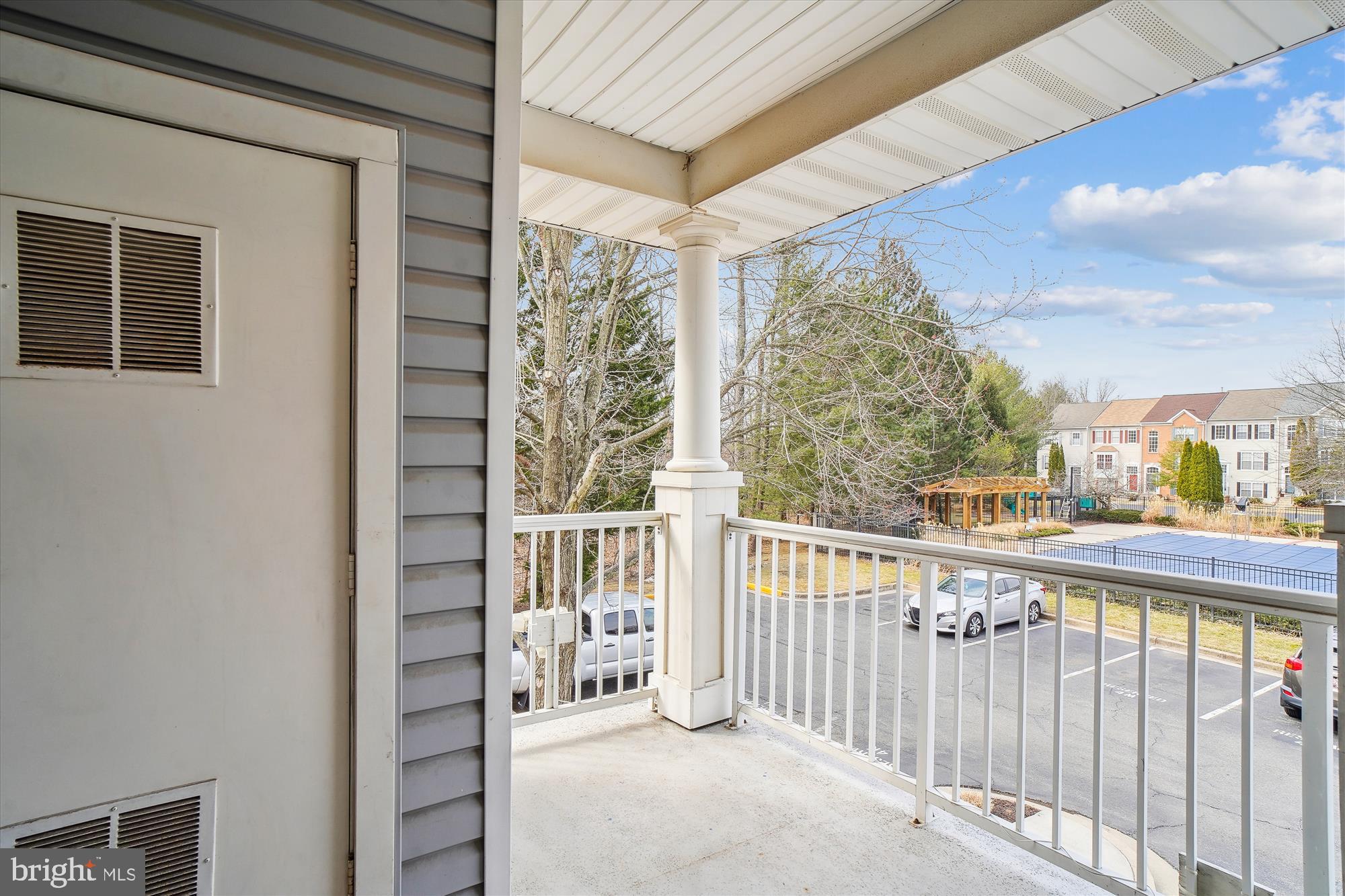 12712 Found Stone Road, Unit 4206 Germantown, MD 20876 - Photo 30 of 58 a view of a balcony with furniture