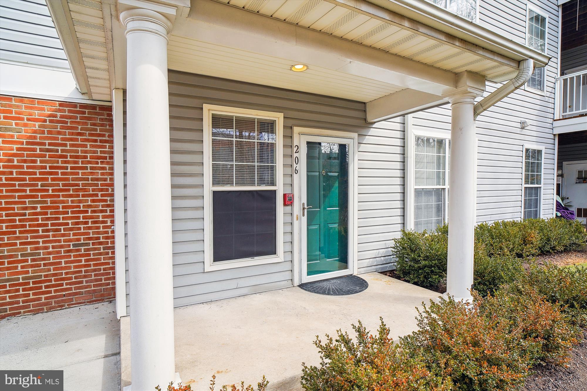 12712 Found Stone Road, Unit 4206 Germantown, MD 20876 - Photo 3 of 58 a view of yellow house with plants
