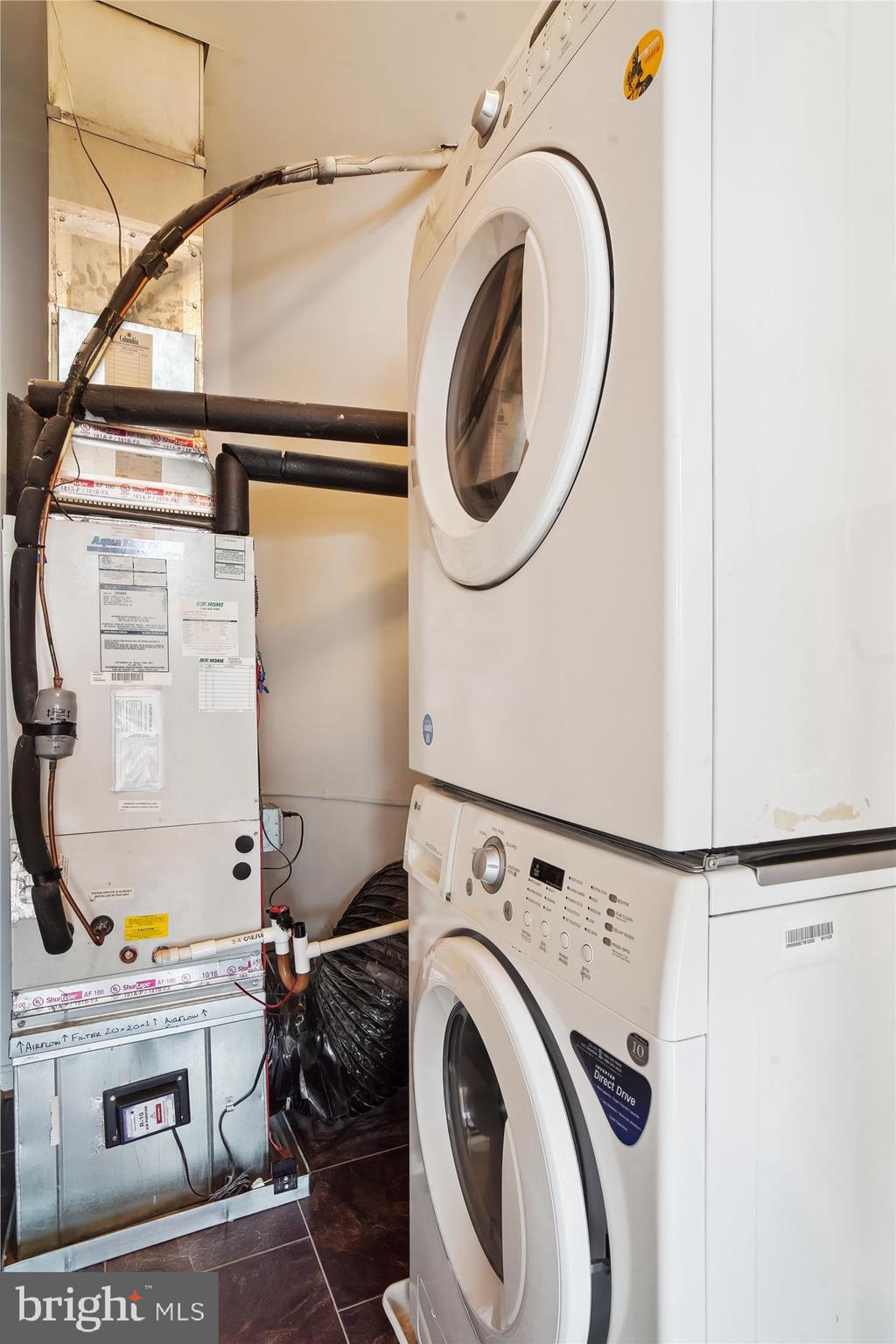 12712 Found Stone Road, Unit 4206 Germantown, MD 20876 - Photo 31 of 58 a utility room with dryer and washer