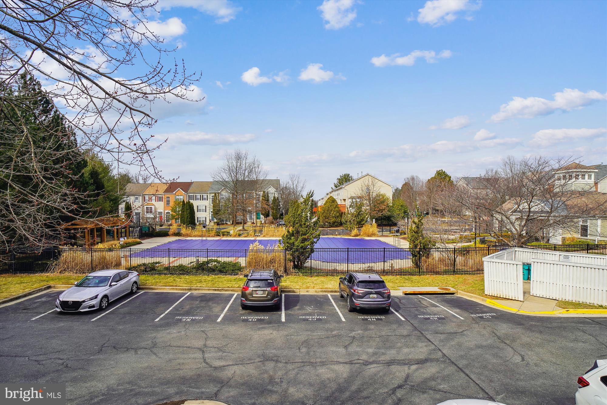 12712 Found Stone Road, Unit 4206 Germantown, MD 20876 - Photo 37 of 58 a view of swimming pool with outdoor seating and yard in the back