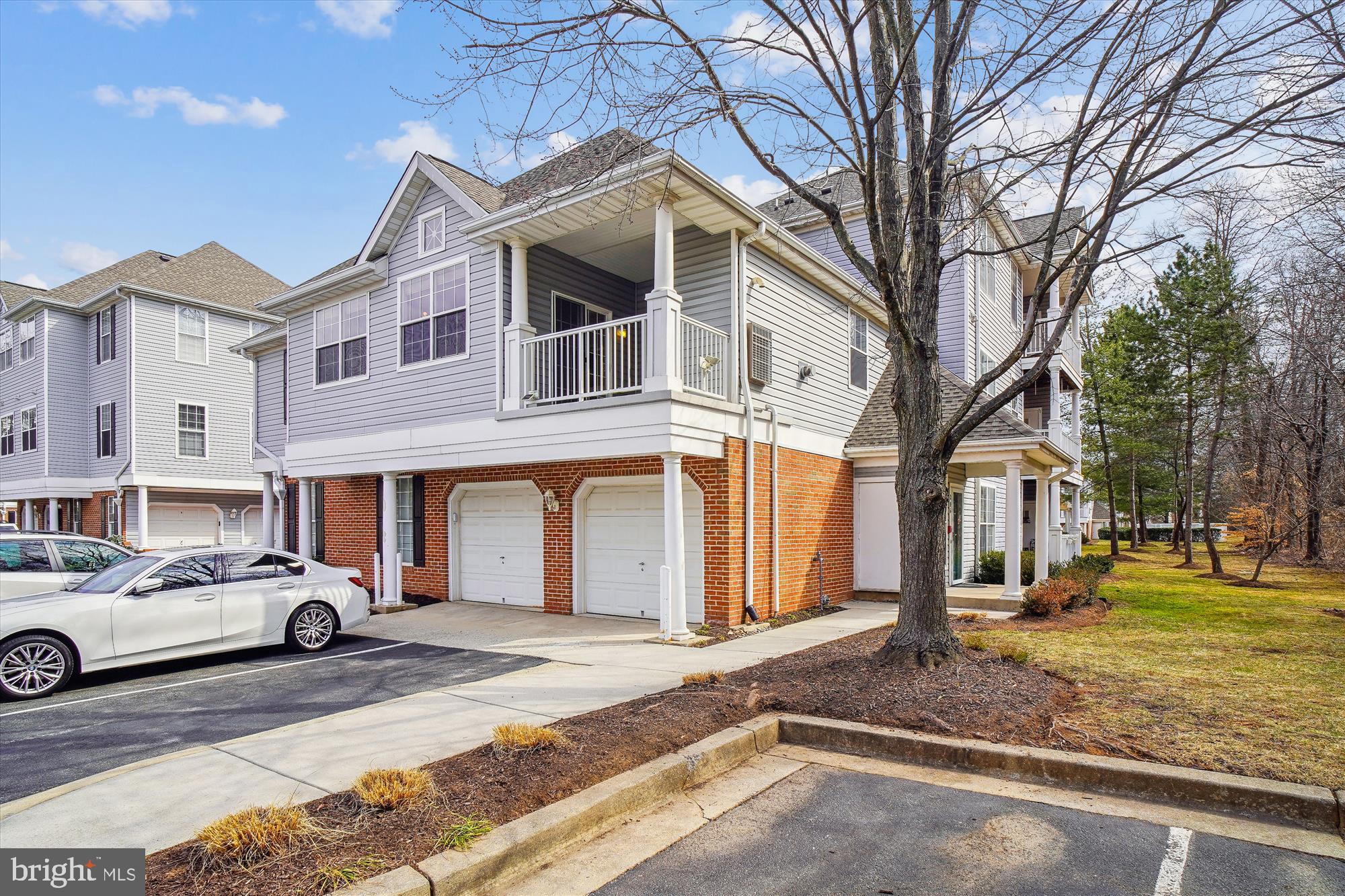 12712 Found Stone Road, Unit 4206 Germantown, MD 20876 - Photo 39 of 58 a front view of a residential houses with yard