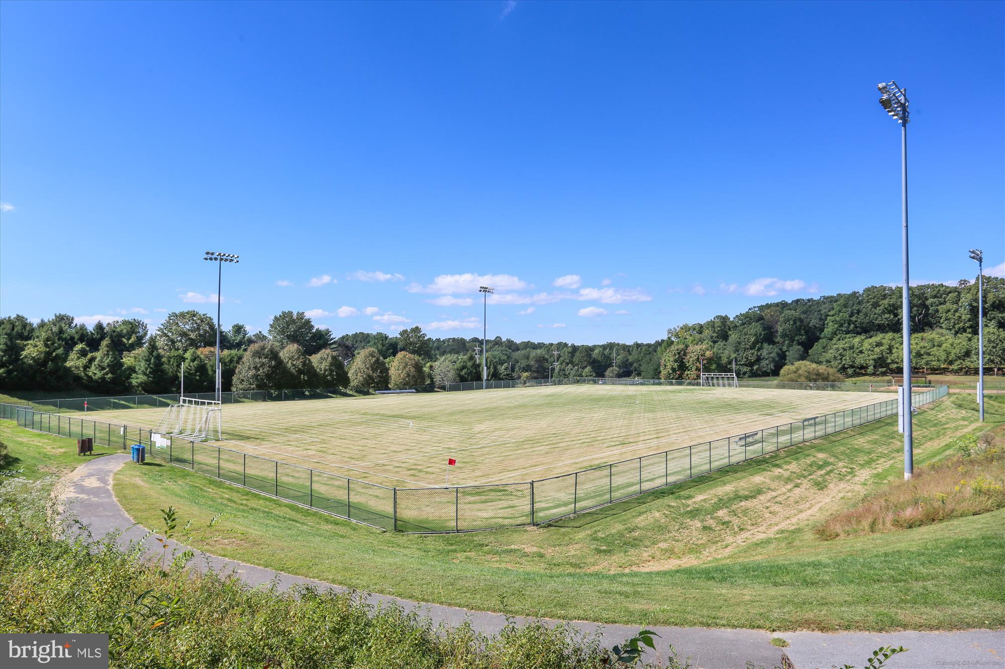 12712 Found Stone Road, Unit 4206 Germantown, MD 20876 - Photo 56 of 58 a view of a field with a yard