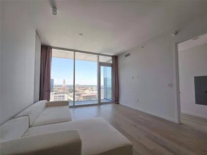 a living room with a large window