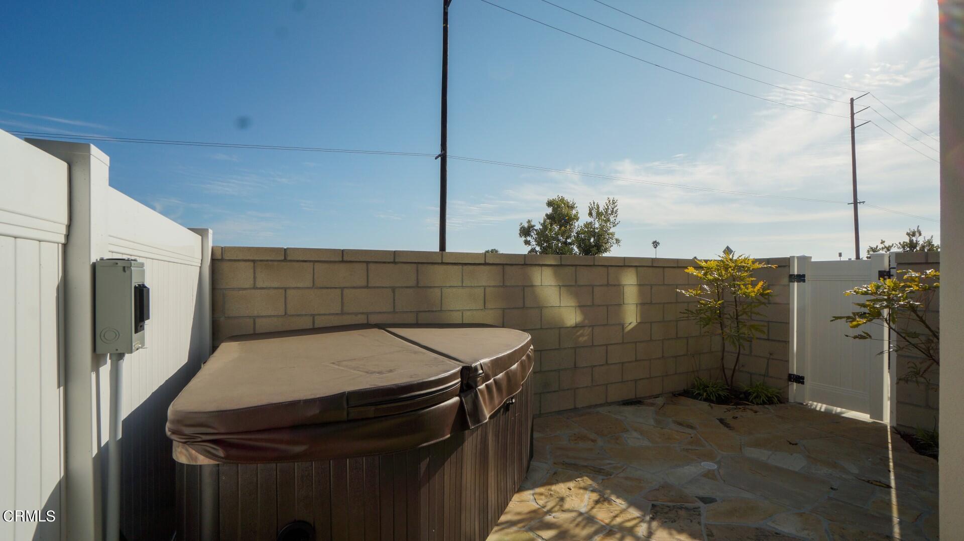 1063 Canal Street Oxnard, CA 93035 - Photo 29 of 32 a bathroom with a sink and shower