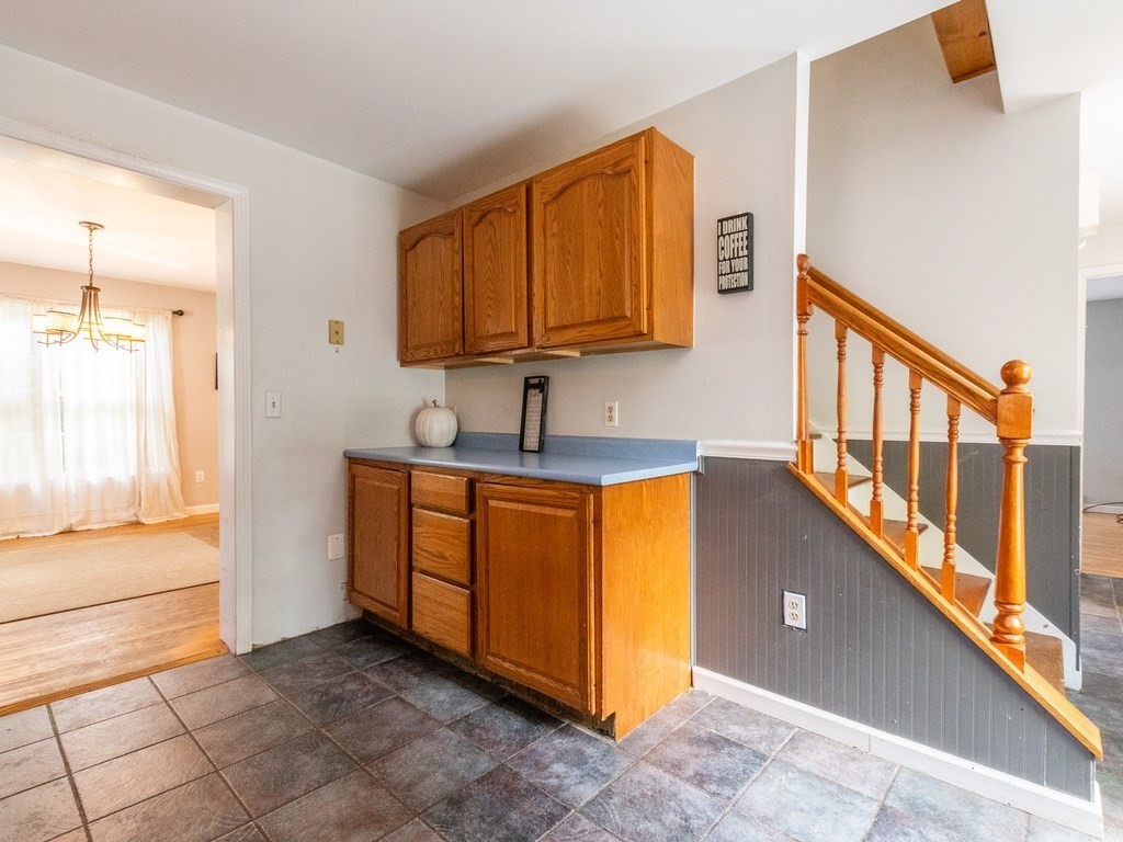 2 Columbia Road Billerica, MA 01821 - Photo 6 of 30 a view of a kitchen from the hallway