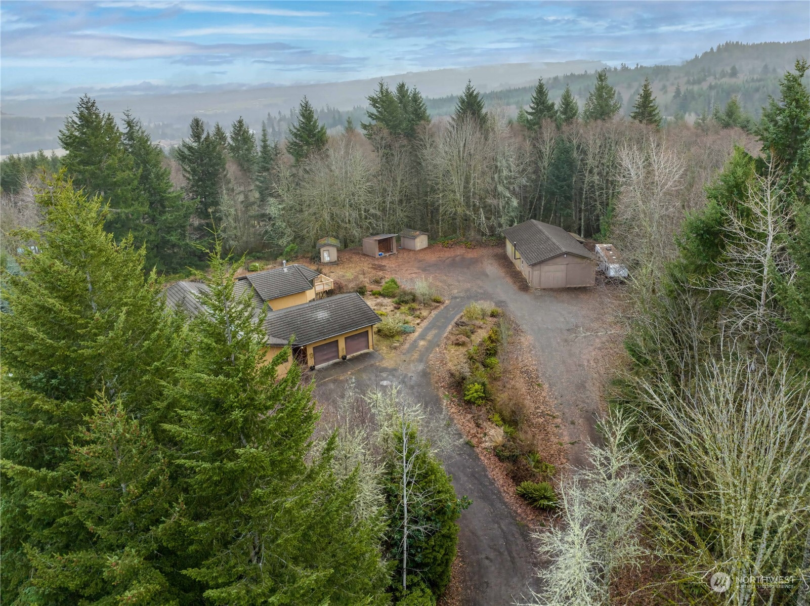 133 Ridgeview Road Chehalis, WA 98532 - Photo 31 of 32 a backyard of a house with lots of green space