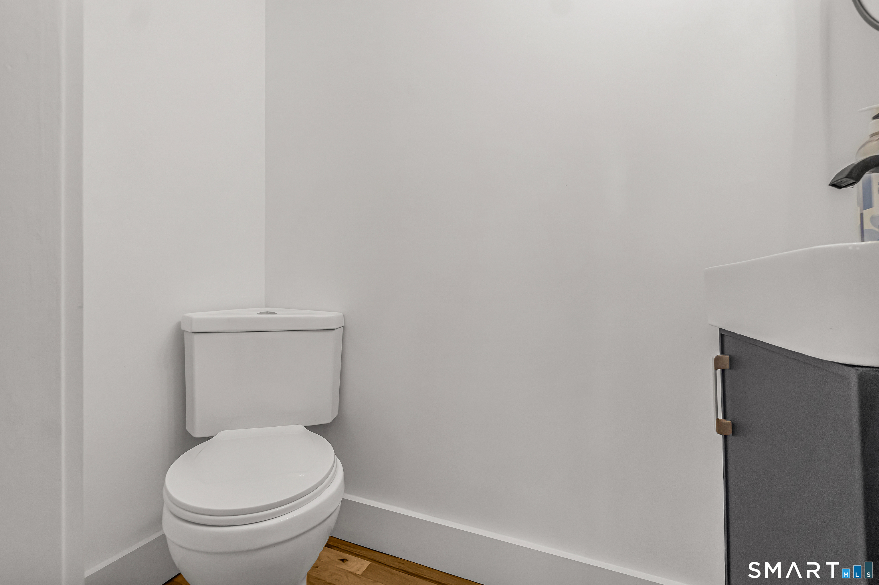 2 Rolf Drive Danbury, CT 06810 - Photo 19 of 32 a white toilet sitting next to a white wall