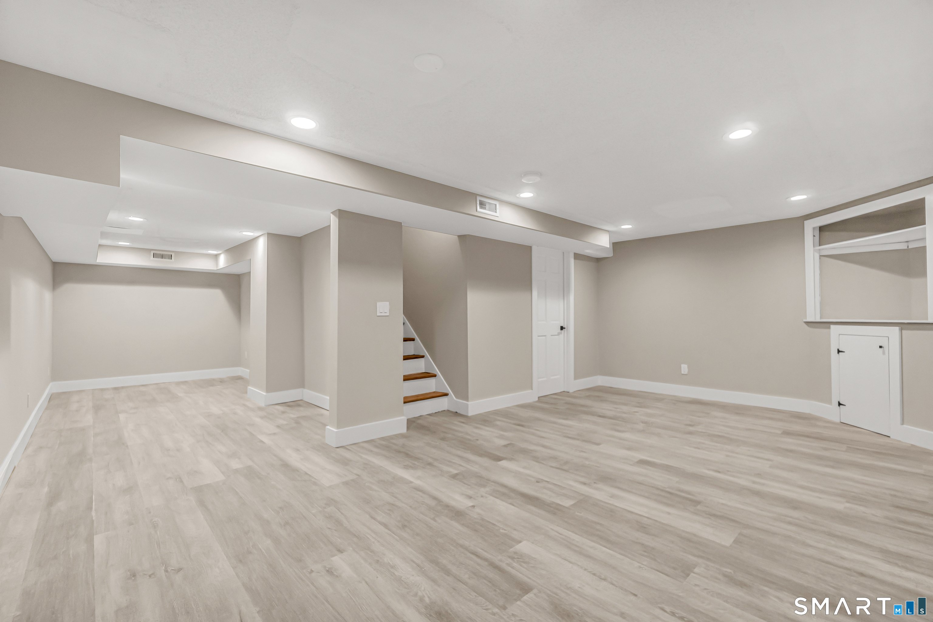 2 Rolf Drive Danbury, CT 06810 - Photo 26 of 32 a view of an empty room with wooden floor and closet