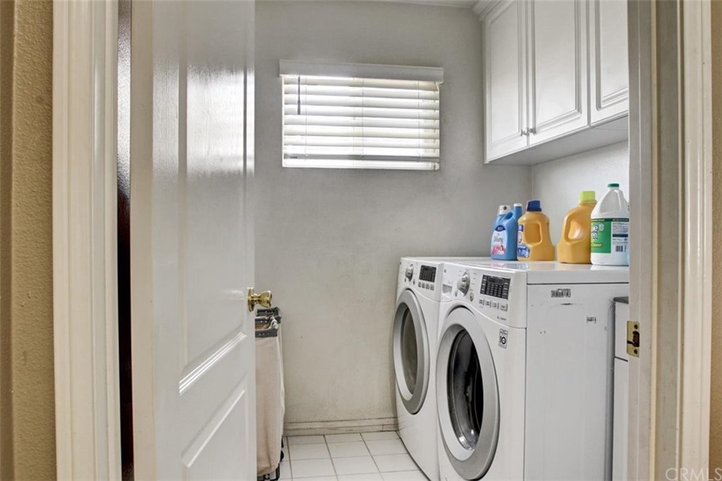 973 Thicket Drive Carson, CA 90746 - Photo 21 of 32 a utility room with dryer and washer