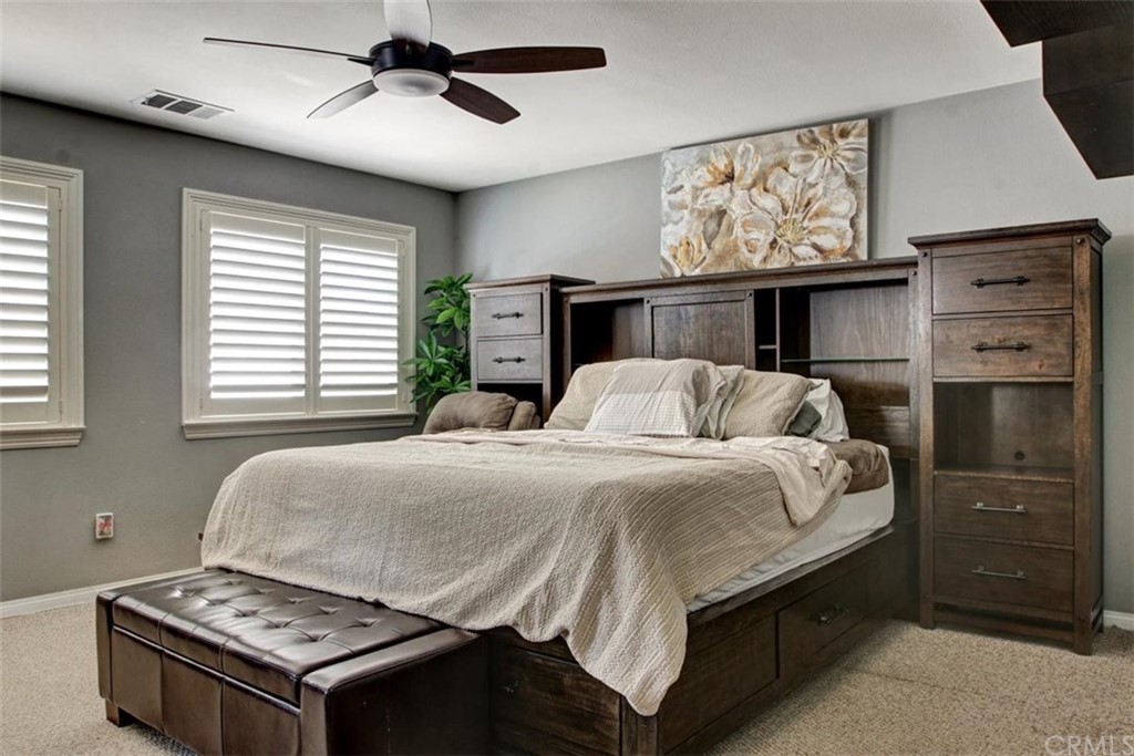 973 Thicket Drive Carson, CA 90746 - Photo 22 of 32 a bedroom with a bed and a dresser