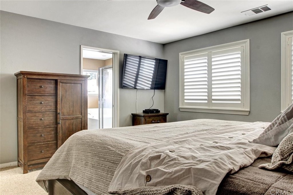 973 Thicket Drive Carson, CA 90746 - Photo 24 of 32 a bedroom with a bed and a window