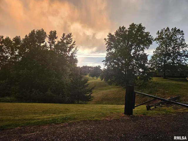 a view of an outdoor space with a lake view