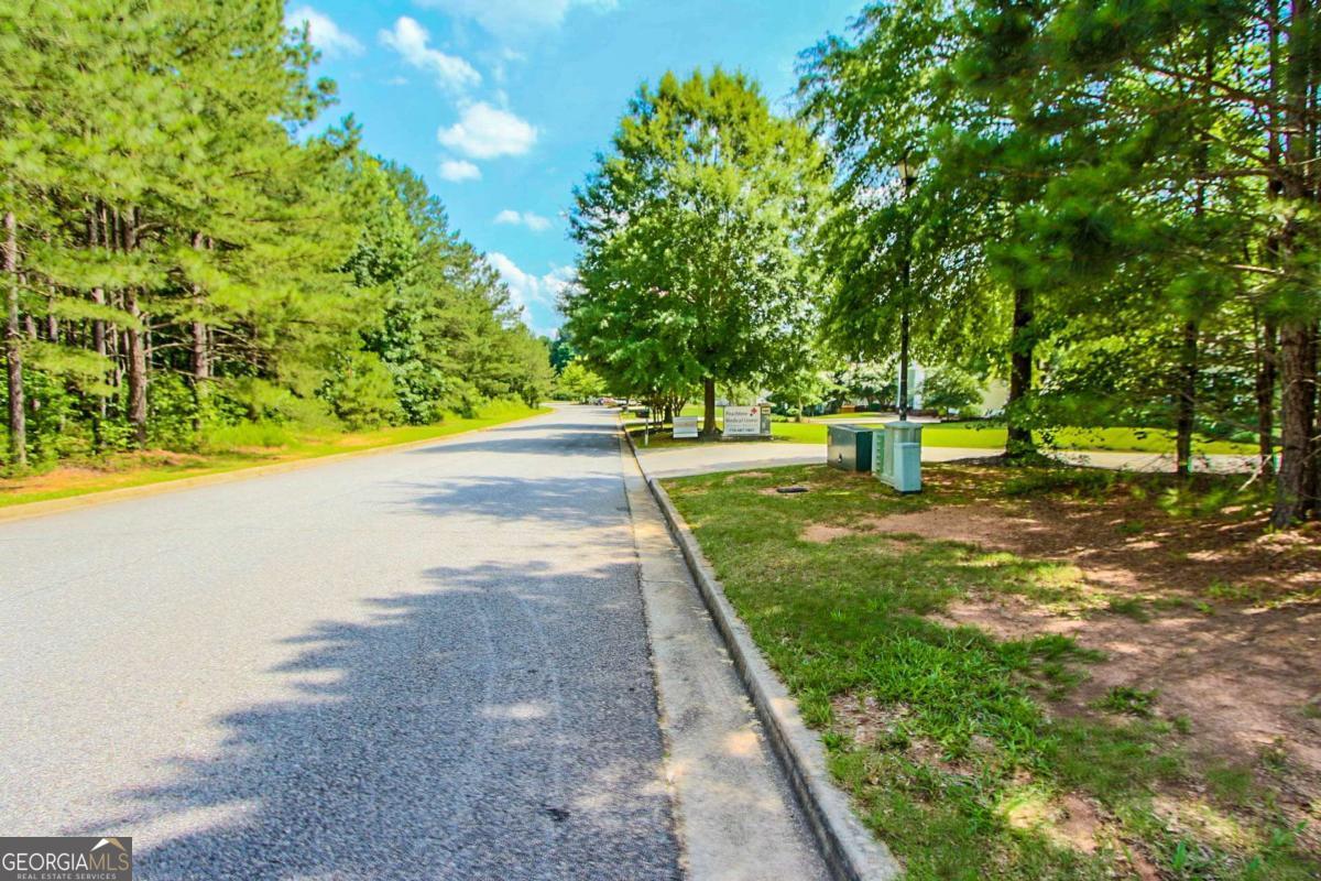 180 Greencastle Road Tyrone, GA 30290 - Photo 6 of 9 a view of an outdoor space with a lake view
