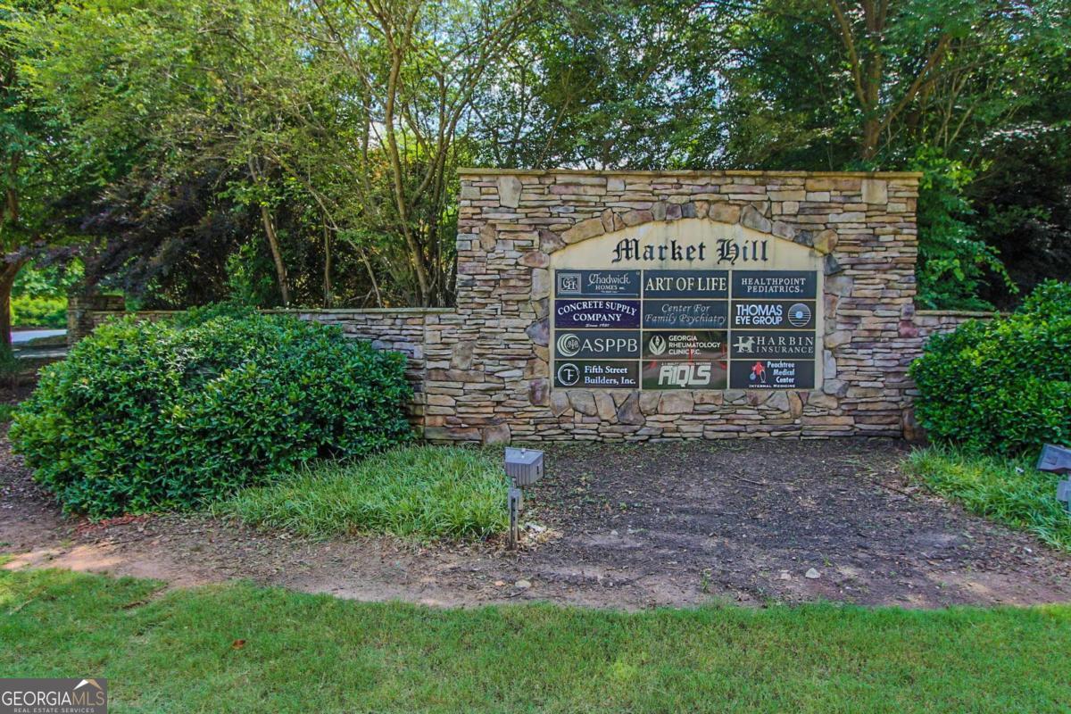 180 Greencastle Road Tyrone, GA 30290 - Photo 9 of 9 a view of a big house with a yard