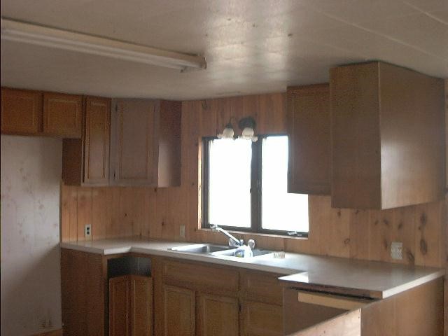 31197 Willow Road Lanark, IL 61046 - Photo 4 of 5 a bathroom with a sink and a mirror