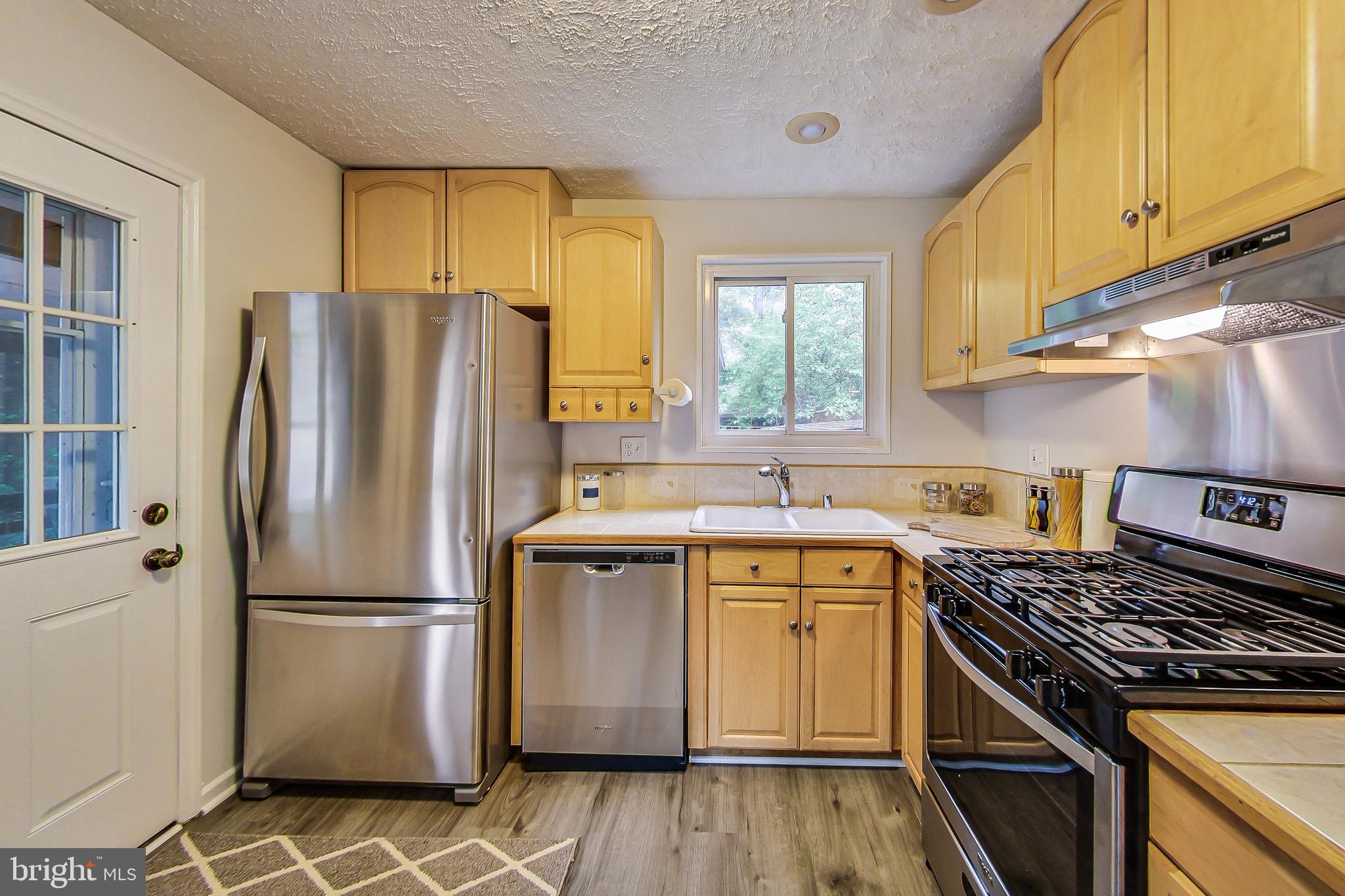 3200 Kayson Street Silver Spring, MD 20906 - Photo 9 of 37 Kitchen w/New SS Appliances
