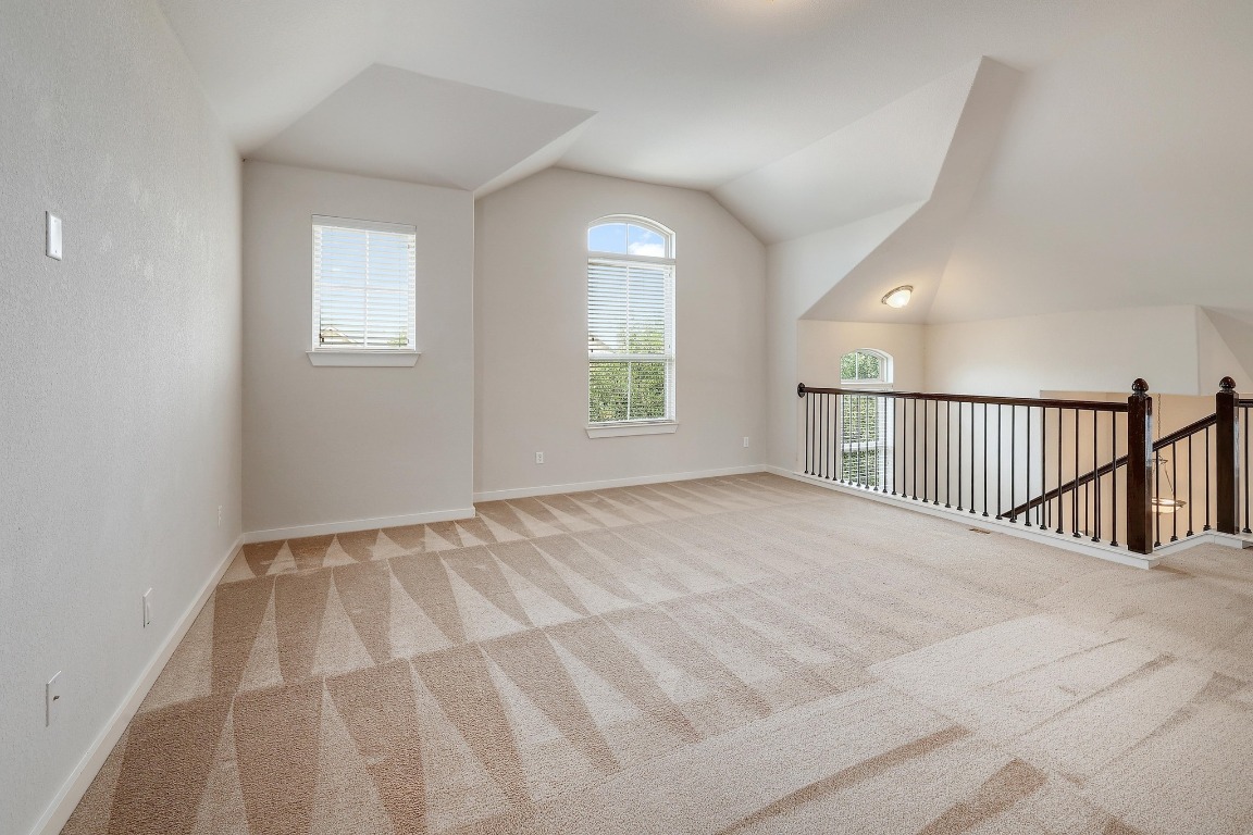 16233 Travesia Way Austin, TX 78728 - Photo 17 of 27 a view of an empty room and window