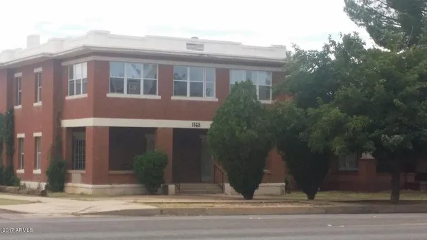 a view of a house with a terrace