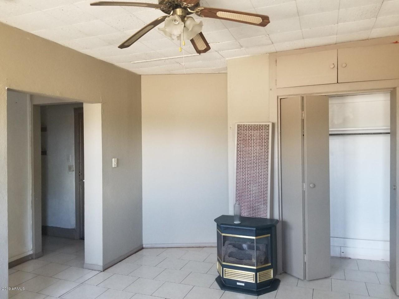 1165 East 10th Street Douglas, AZ 85607 - Photo 20 of 54 a view of a hallway with closet