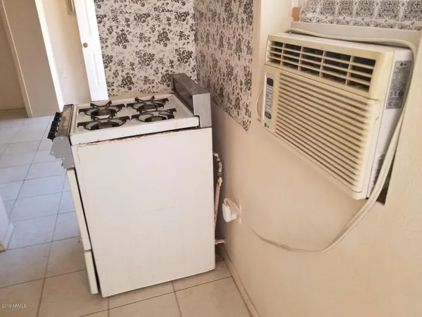 a bathroom with a sink and vanity