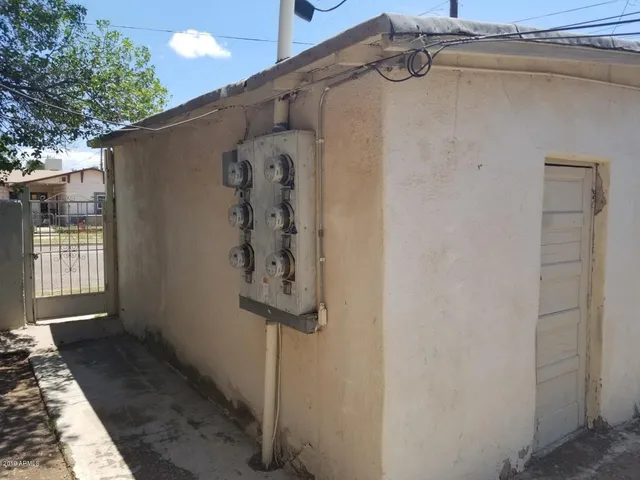 a view of a building with a yard