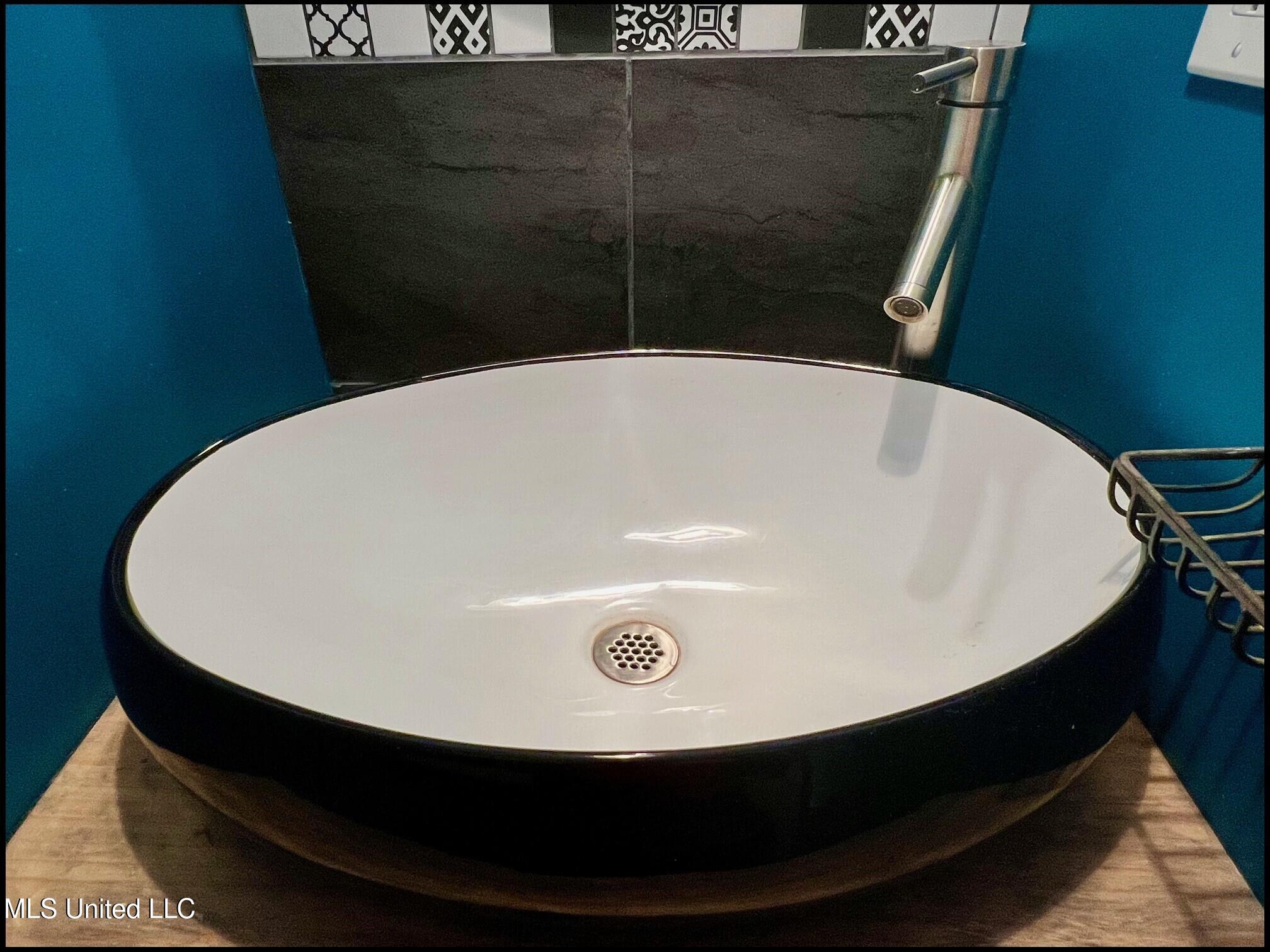 202 Bates Street Batesville, MS 38606 - Photo 57 of 92 202 BATES - GUEST BATH 6 - SINK 2