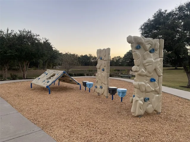 a view of a lake with a yard
