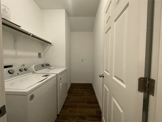 a utility room with dryer and washer