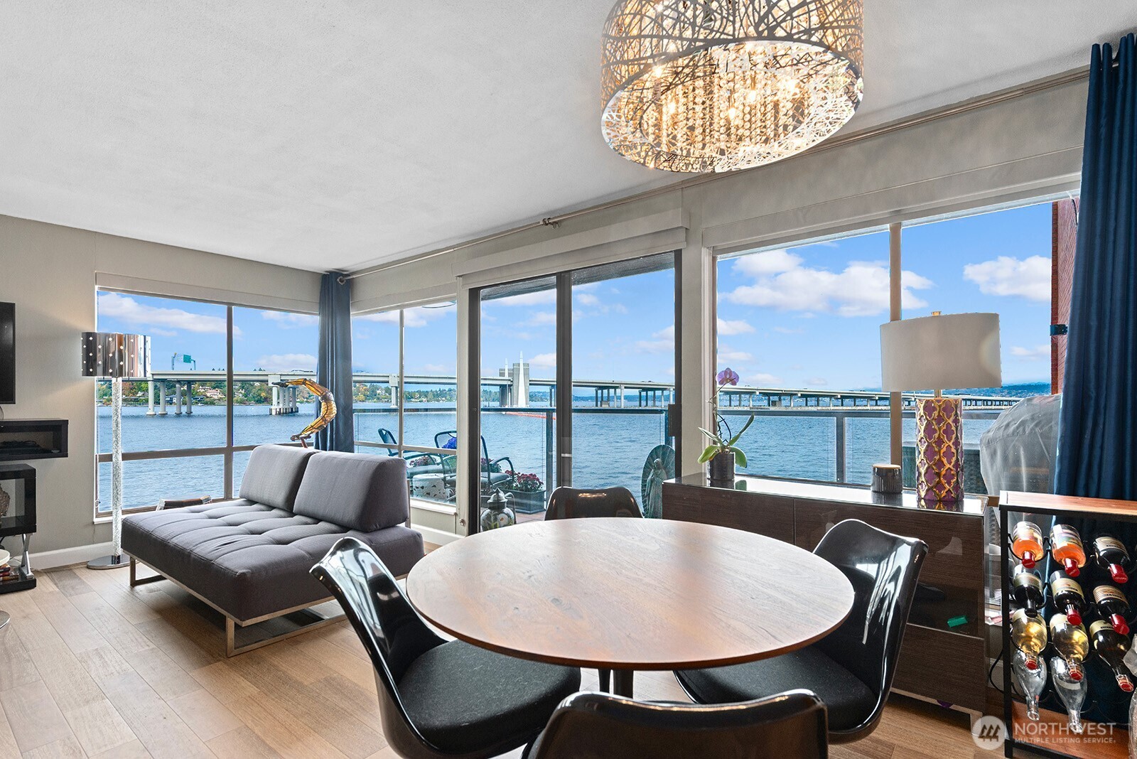 2360 43rd Avenue East, Unit 214 Seattle, WA 98112 - Photo 1 of 34 a living room with furniture and a large window