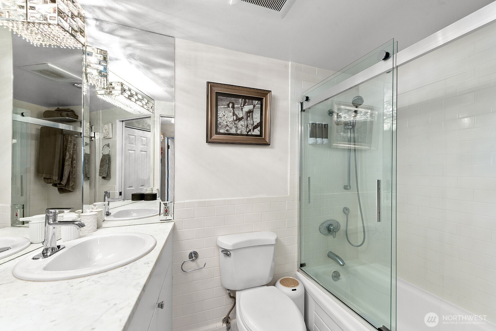 2360 43rd Avenue East, Unit 214 Seattle, WA 98112 - Photo 19 of 34 a bathroom with a sink toilet and shower