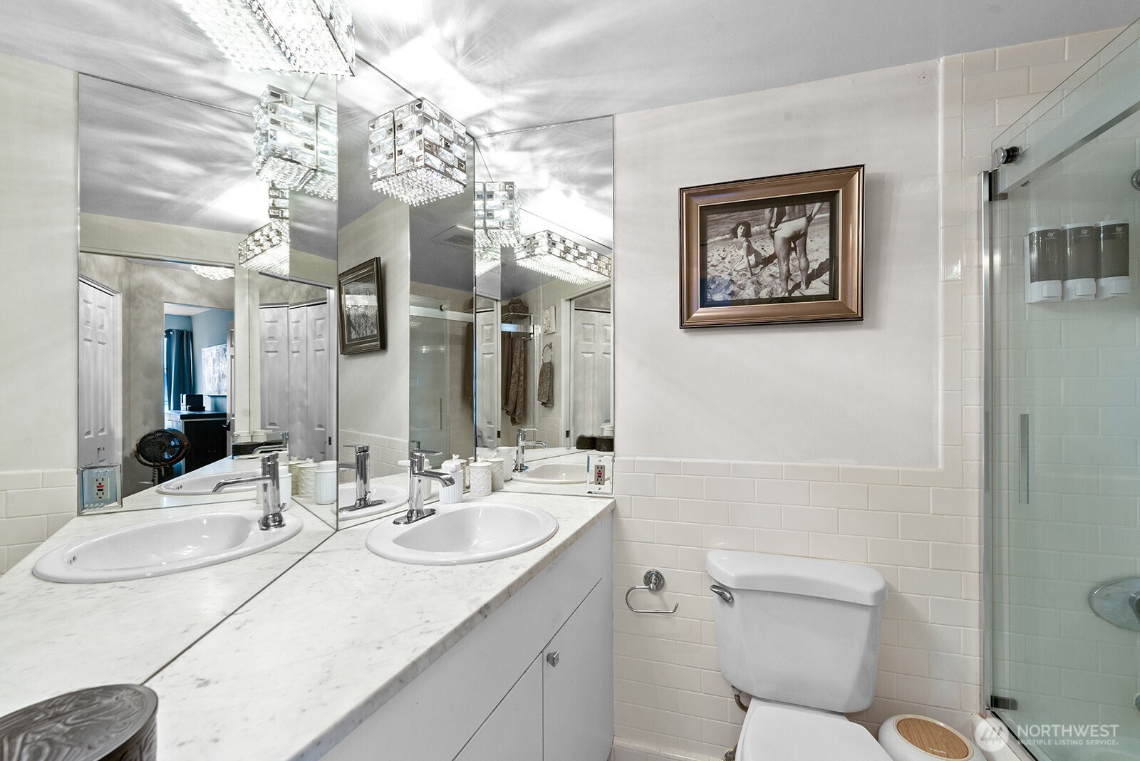 2360 43rd Avenue East, Unit 214 Seattle, WA 98112 - Photo 20 of 34 a bathroom with a sink vanity granite and toilet
