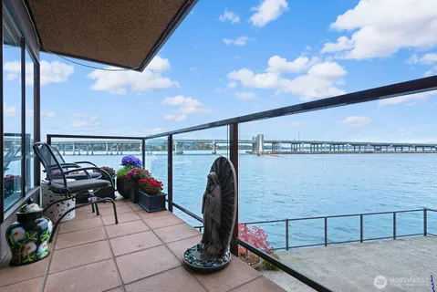 a view of swimming pool with furniture