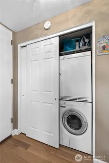 a view of a storage & utility room with washer and dryer