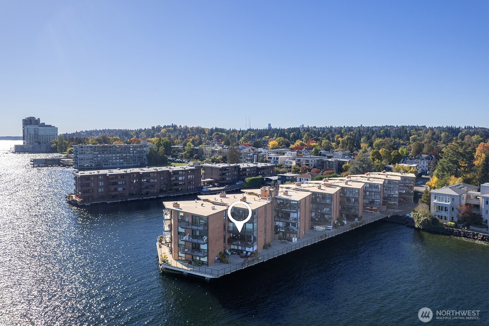 2360 43rd Avenue East, Unit 214 Seattle, WA 98112 - Photo 25 of 34 a view of a chairs with wooden floor