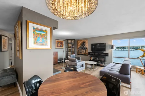 a bedroom with furniture and a flat screen tv